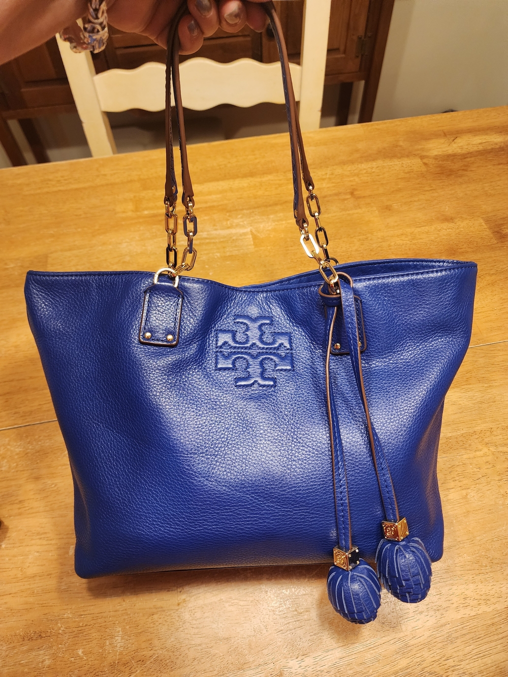 Royal blue Tory Burch leather tote featuring an embossed double-T logo